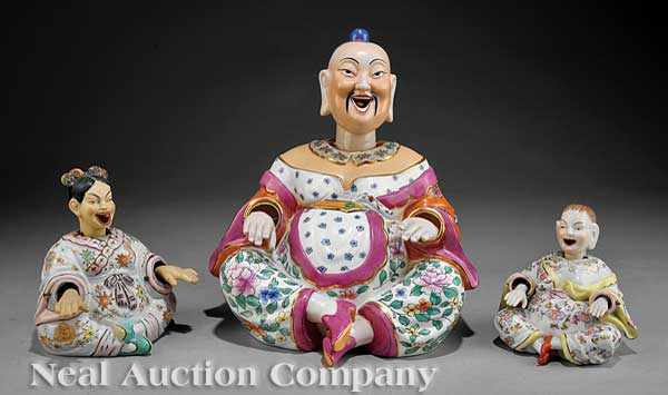 Appraisal: Two Polychrome and Gilt Porcelain Nodder Gossiper Figures one with