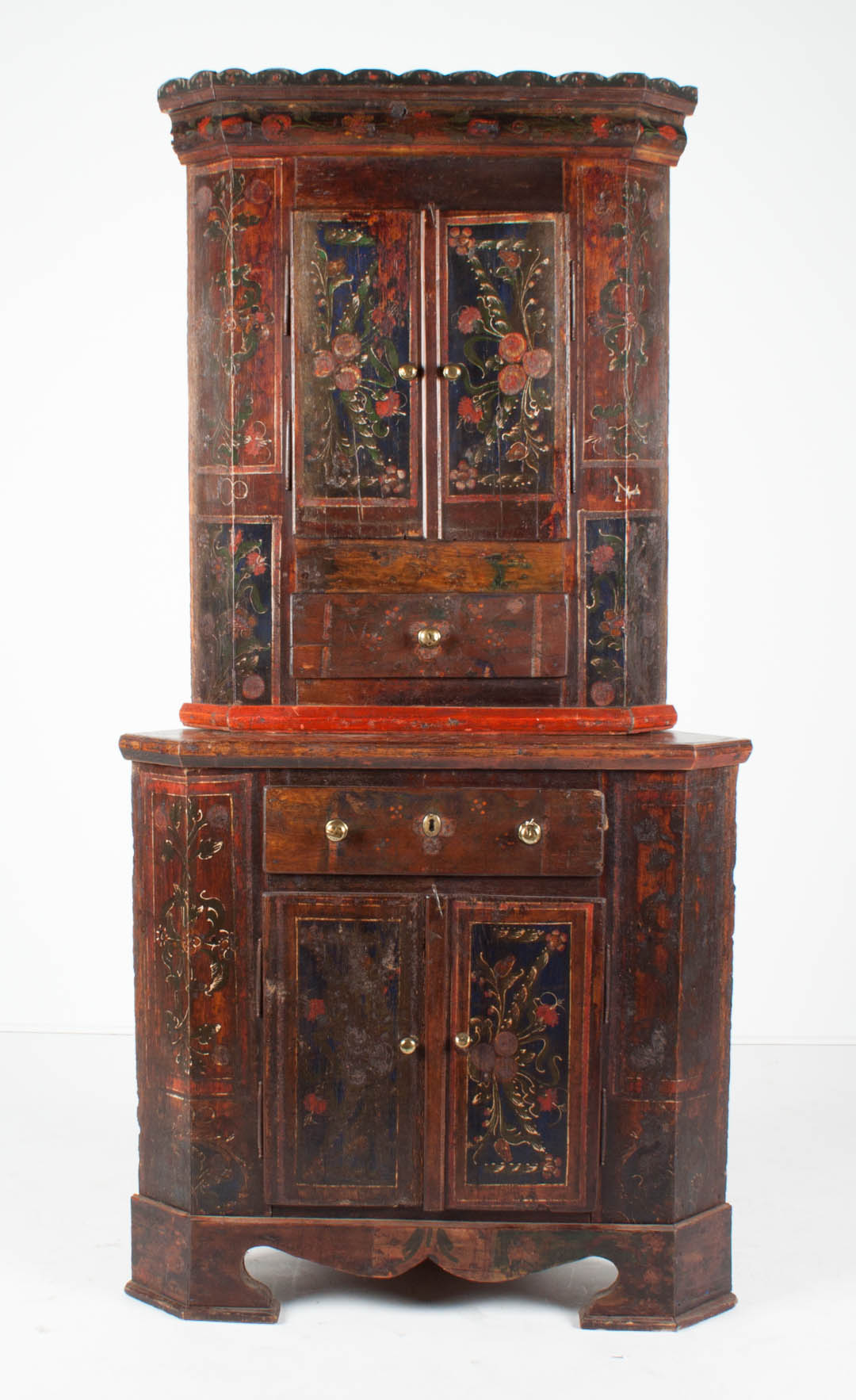 Appraisal: German painted pine corner cupboard floral painted wood upper case