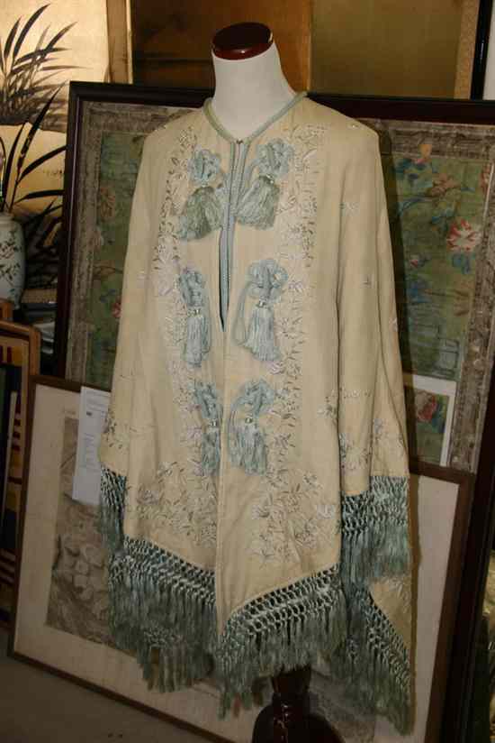 Appraisal: VICTORIAN EMBROIDERED SILK CAPE Circa The cream silk ground with