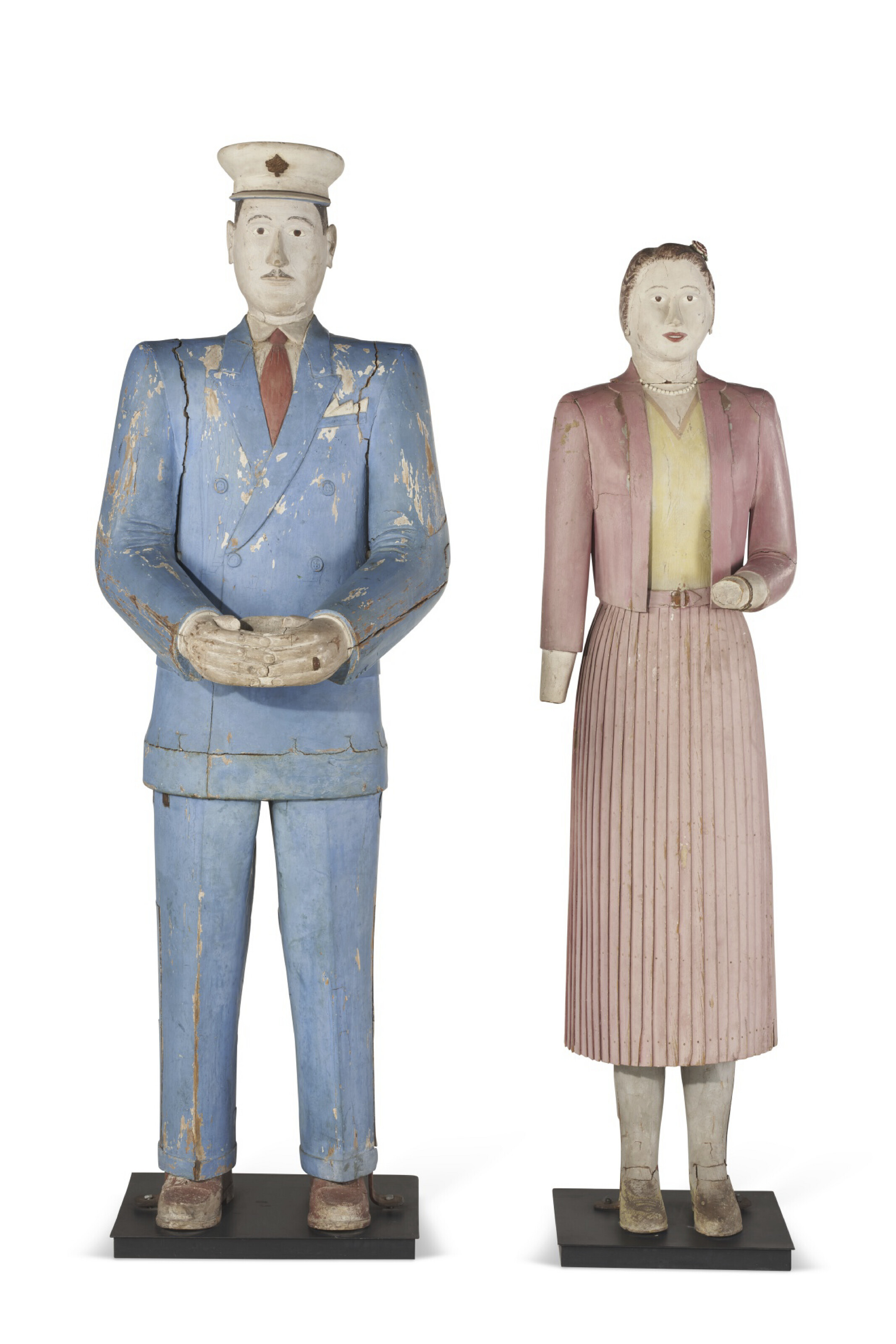 Appraisal: A PAIR OF CARVED AND PAINTED FIGURES OF A MAN