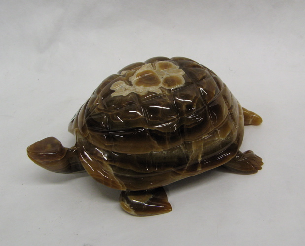 Appraisal: A CARVED AGATE CARAMEL COLORED TURTLE BOX having caramel shading