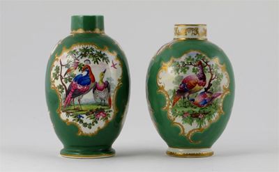 Appraisal: Two Worcester tea caddies painted with colourful exotic birds within