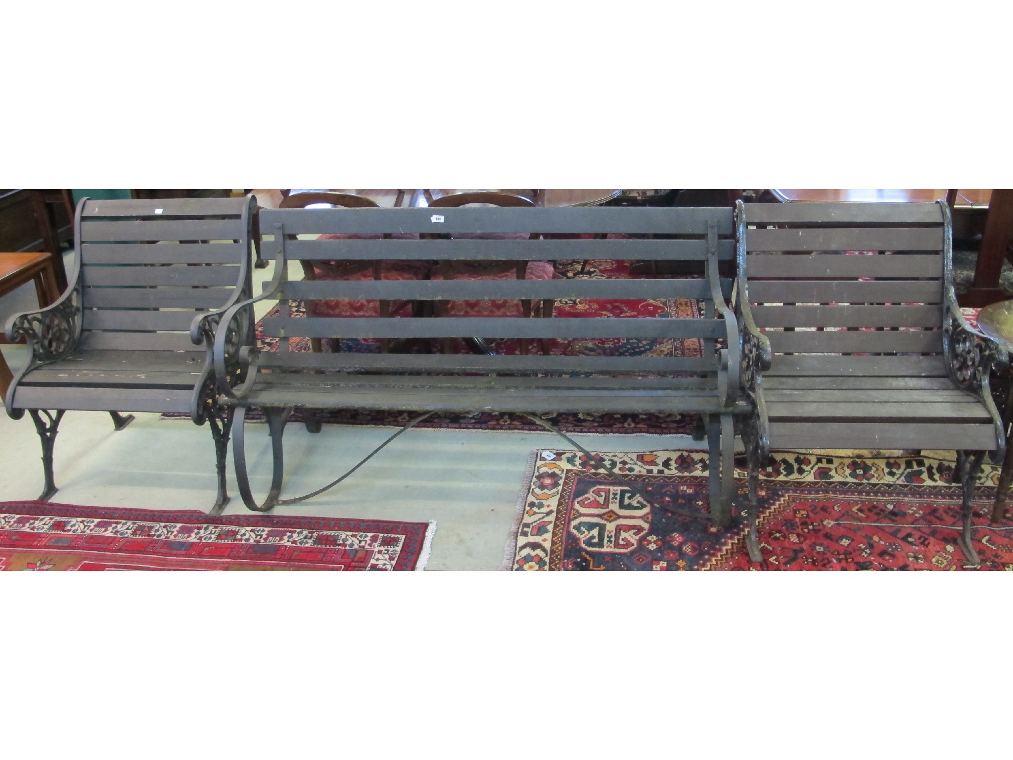 Appraisal: Two cast iron garden chairs and wrought iron garden bench