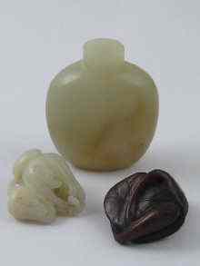 Appraisal: A Chinese jade carving of a longan fruit cm a