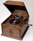 Appraisal: 'S HMV OAK-CASED TABLE-TOP GRAMOPHONE fitted with a pair of