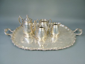 Appraisal: A silver-plated tea service comprising of a twin handled oblong