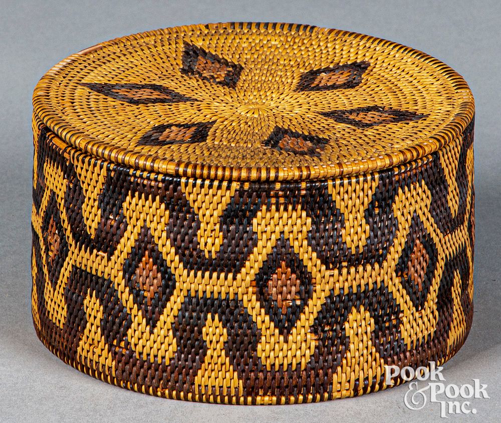 Appraisal: Asiatic coiled lidded basket Asiatic Indian coiled lidded basket with