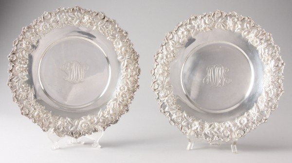 Appraisal: Matched pair of hand decorated repousse sterling serving plates floral