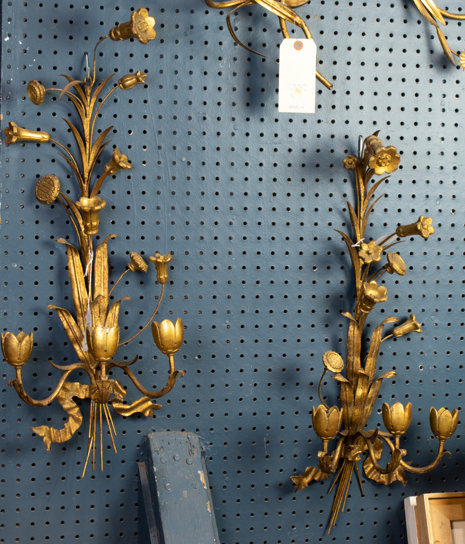 Appraisal: Pair of Italian gilt tole and wood three-light candle sconces