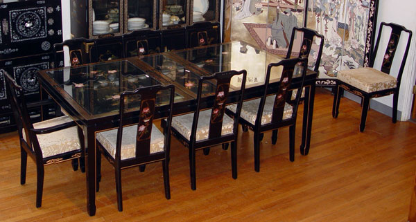 Appraisal: CHINESE BLACK LACQUER DINING TABLE CHAIRS Paint decorated table with