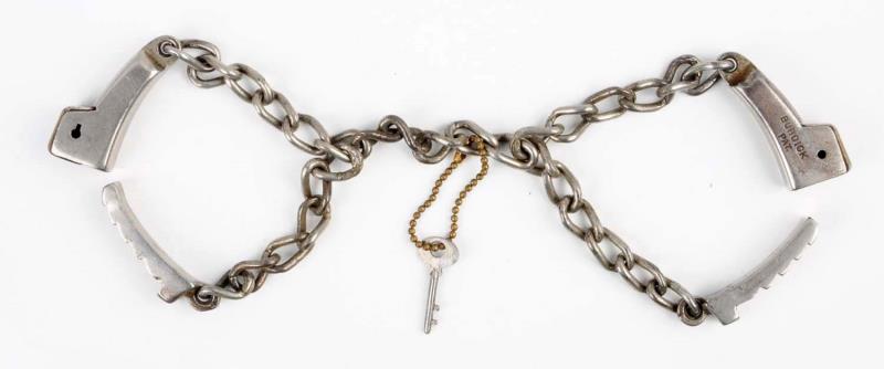 Appraisal: Burdick Chain Handcuffs Circa Nice nickel finish Smooth operation Size