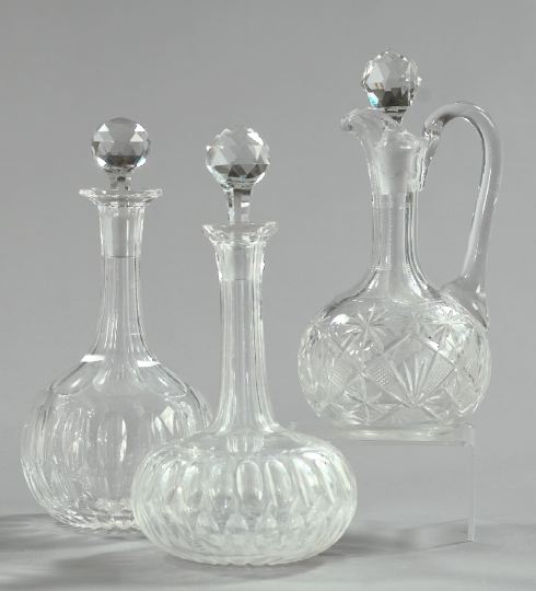 Appraisal: Group of Three Glass Decanters consisting of an English cut