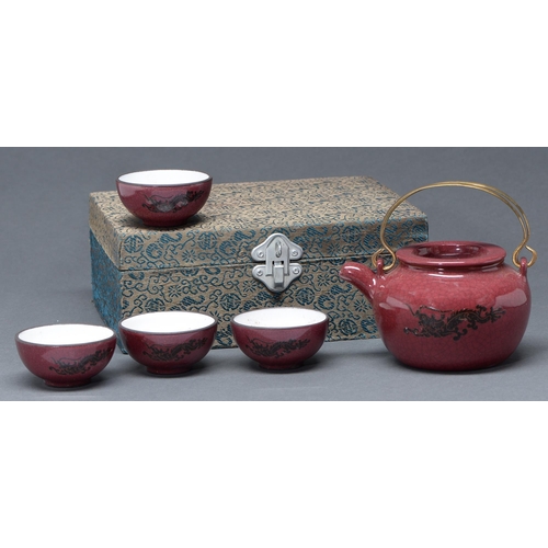 Appraisal: A Chinese plum glazed terracotta wine pot and cover and