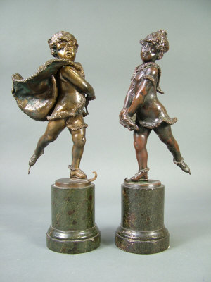 Appraisal: After Franz Iffland-A pair of bronze figures of young ice