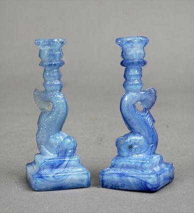 Appraisal: Pair of American Pressed Glass Dolphin-Form Miniature Candlesticks Probably Boston