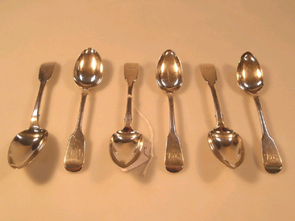 Appraisal: A pair of George V silver fiddle pattern dessert spoons