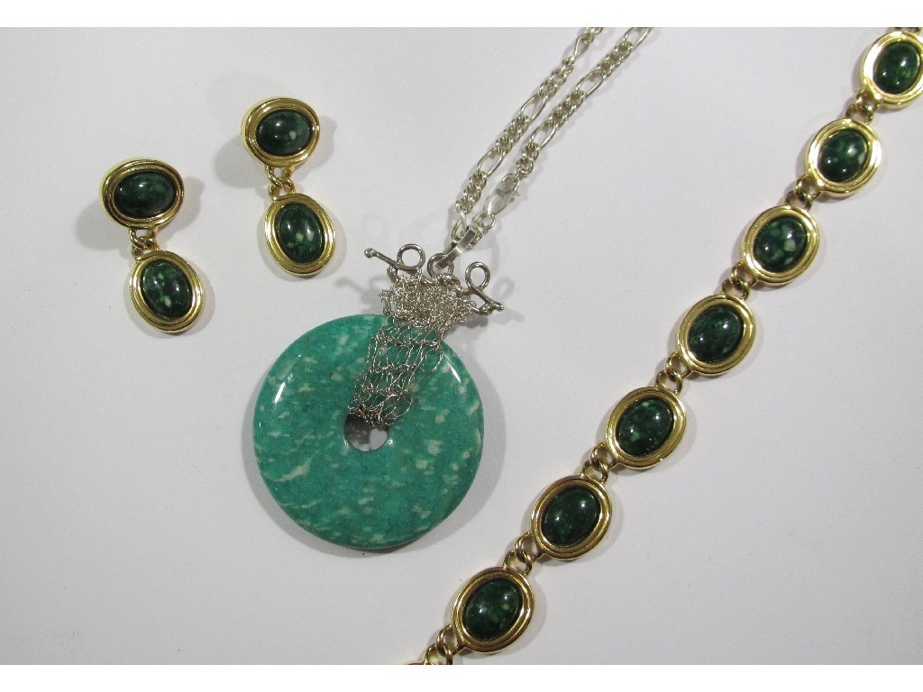 Appraisal: Jadeite disc pendant on silver neckchain and a costume necklace