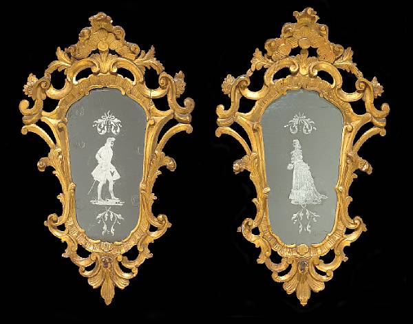 Appraisal: A pair of Italian Rococo giltwood and etched girandole mirrors