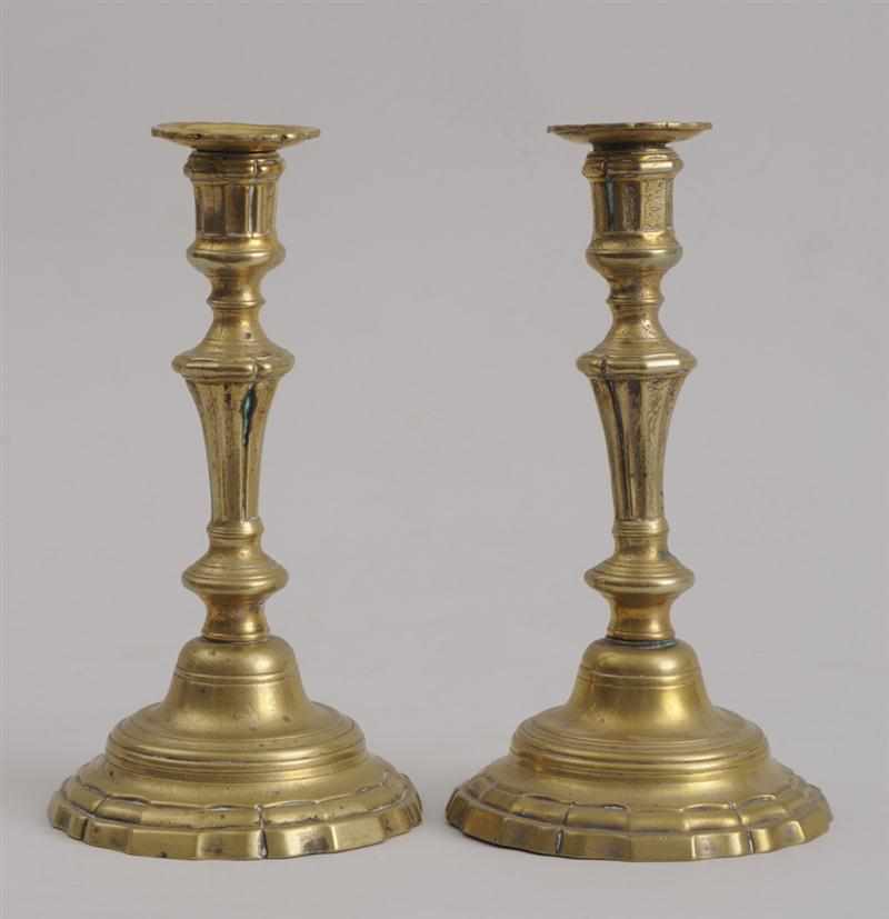 Appraisal: PAIR OF LOUIS XV BRASS CANDLESTICKS AND A GILT-METAL MOUNTED