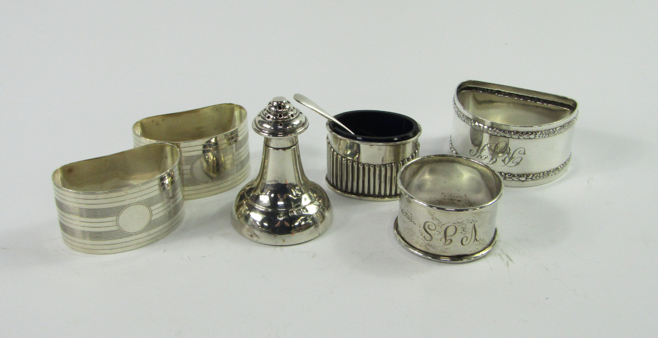 Appraisal: A pair of George V silver kidney shaped napkin rings