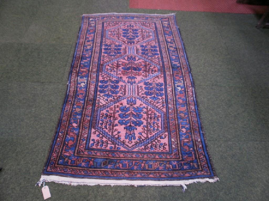 Appraisal: An early thC Caucasian rug ground in blue and red