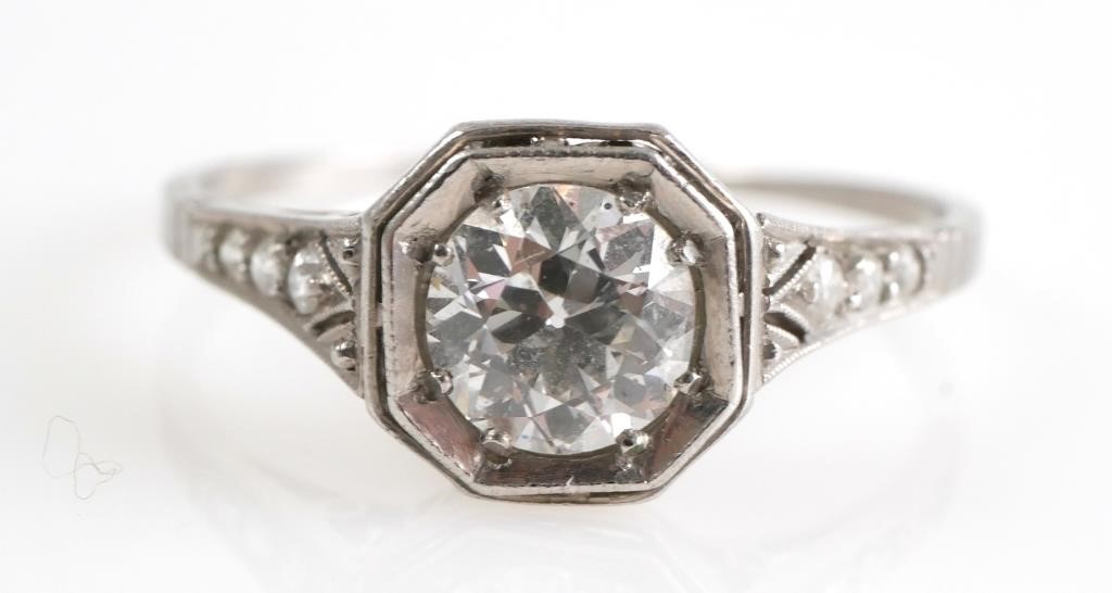 Appraisal: PLATINUM DIAMOND GYPSY SET RINGPlatinum and diamond ring with milgrain