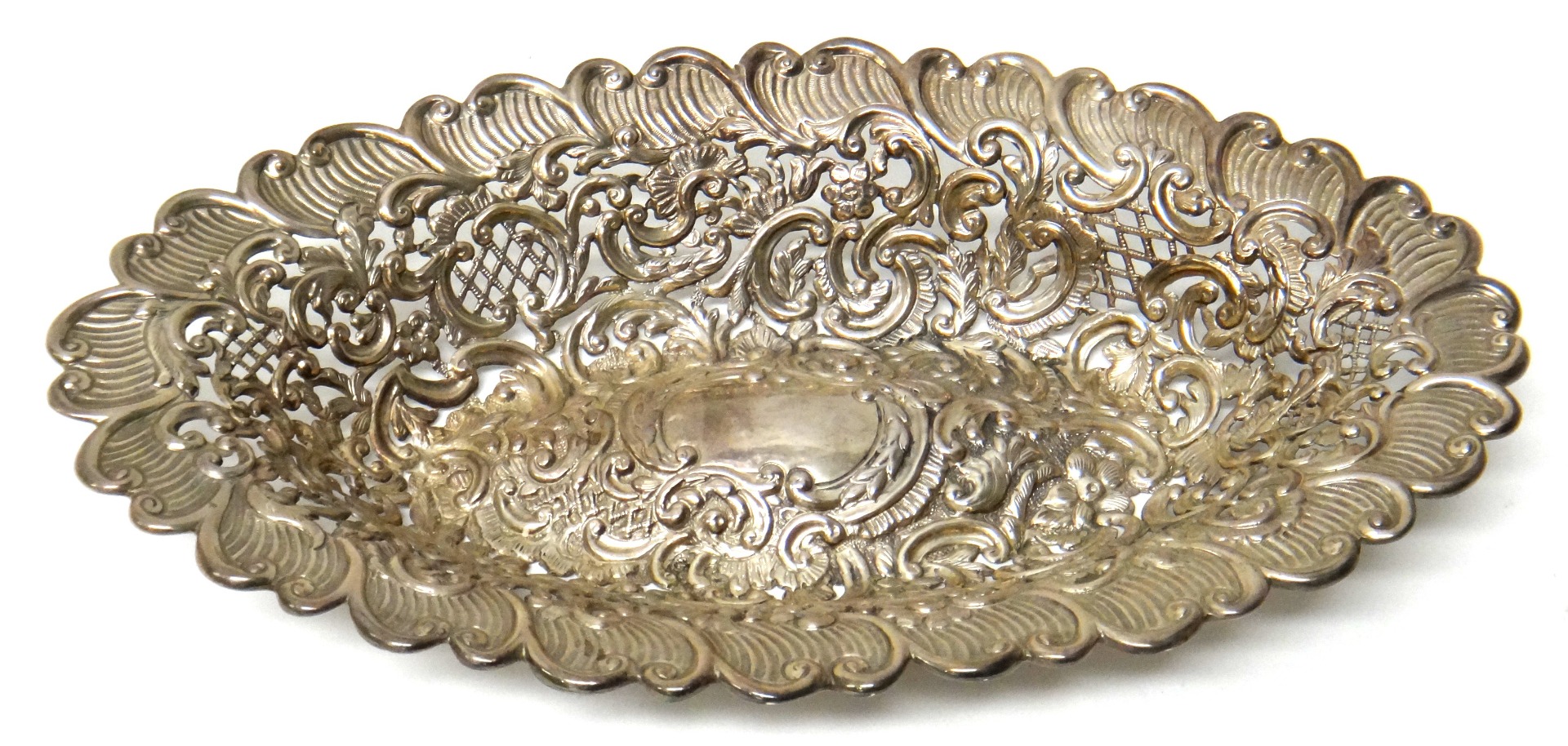 Appraisal: A late Victorian silver oval cake or bread basket with