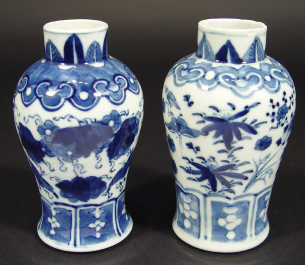 Appraisal: Two oriental porcelain vases each hand painted with blue flowers