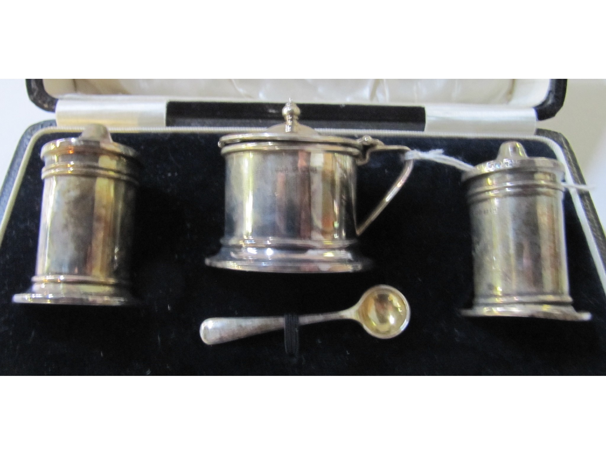 Appraisal: A cased three piece silver condiment set Birmingham