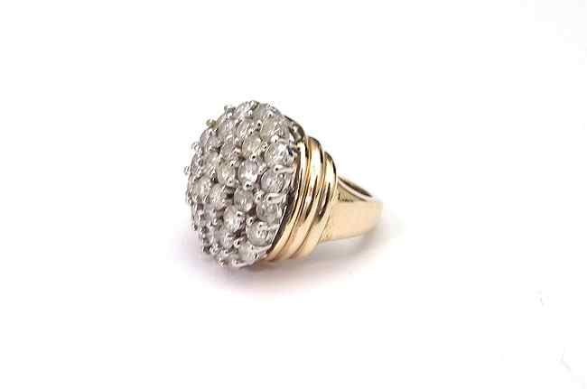 Appraisal: PAVE DIAMOND RING K yellow gold ring contains thirty four