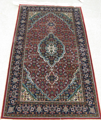 Appraisal: FINE HAND KNOTTED ORIENTAL AREA RUG Persian Bijar design the