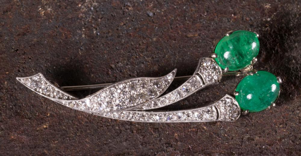 Appraisal: ESTATE EMERALD AND DIAMOND FLORAL PIN The mid th century