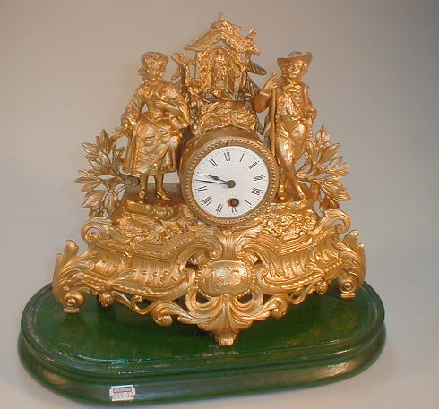 Appraisal: A thC French gilt spelter mantel clock with a timepiece