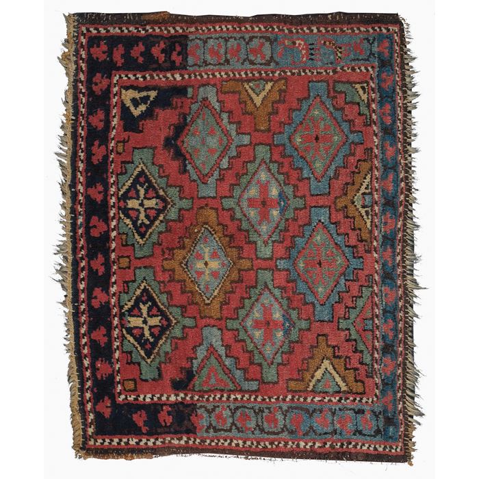 Appraisal: Rare Caucasian sample rug colorful geometric designs on a red