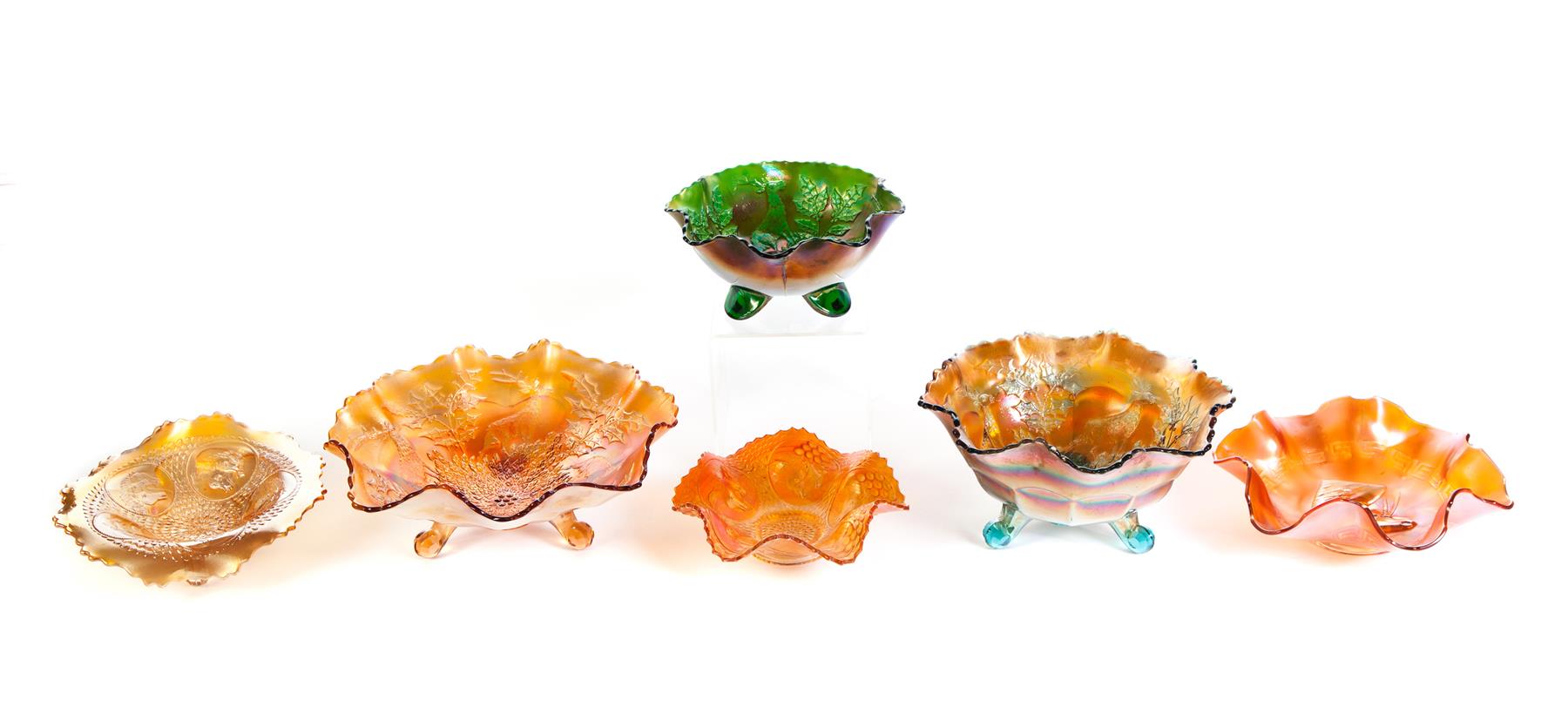 Appraisal: SIX PIECES OF CARNIVAL GLASS American th century Three center