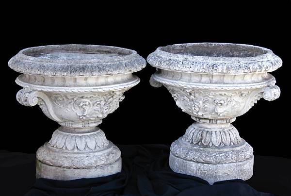 Appraisal: A pair of Neoclassical style painted cast stone urns Each