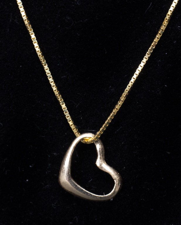 Appraisal: K YELLOW GOLD OPEN HEART PENDANT ON K CHAIN K