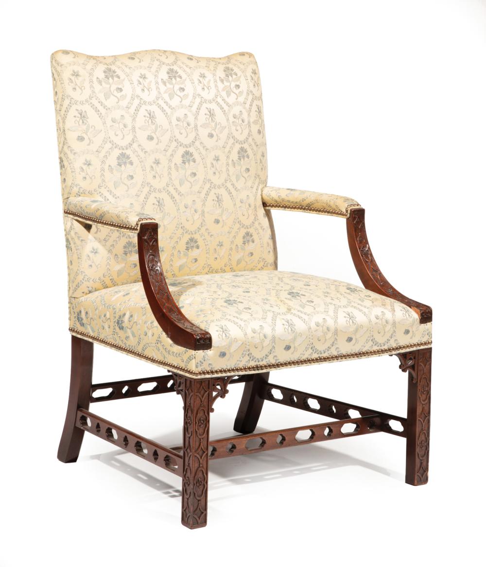 Appraisal: Antique Chippendale-Style Mahogany Gainsborough Chair th c serpentine crest padded