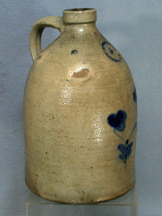 Appraisal: gallon stoneware jar with blue floral decoration signed W Clark