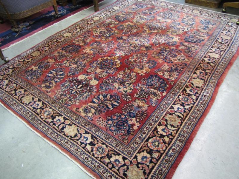 Appraisal: A semi-antique Oriental room size rug red field with blue