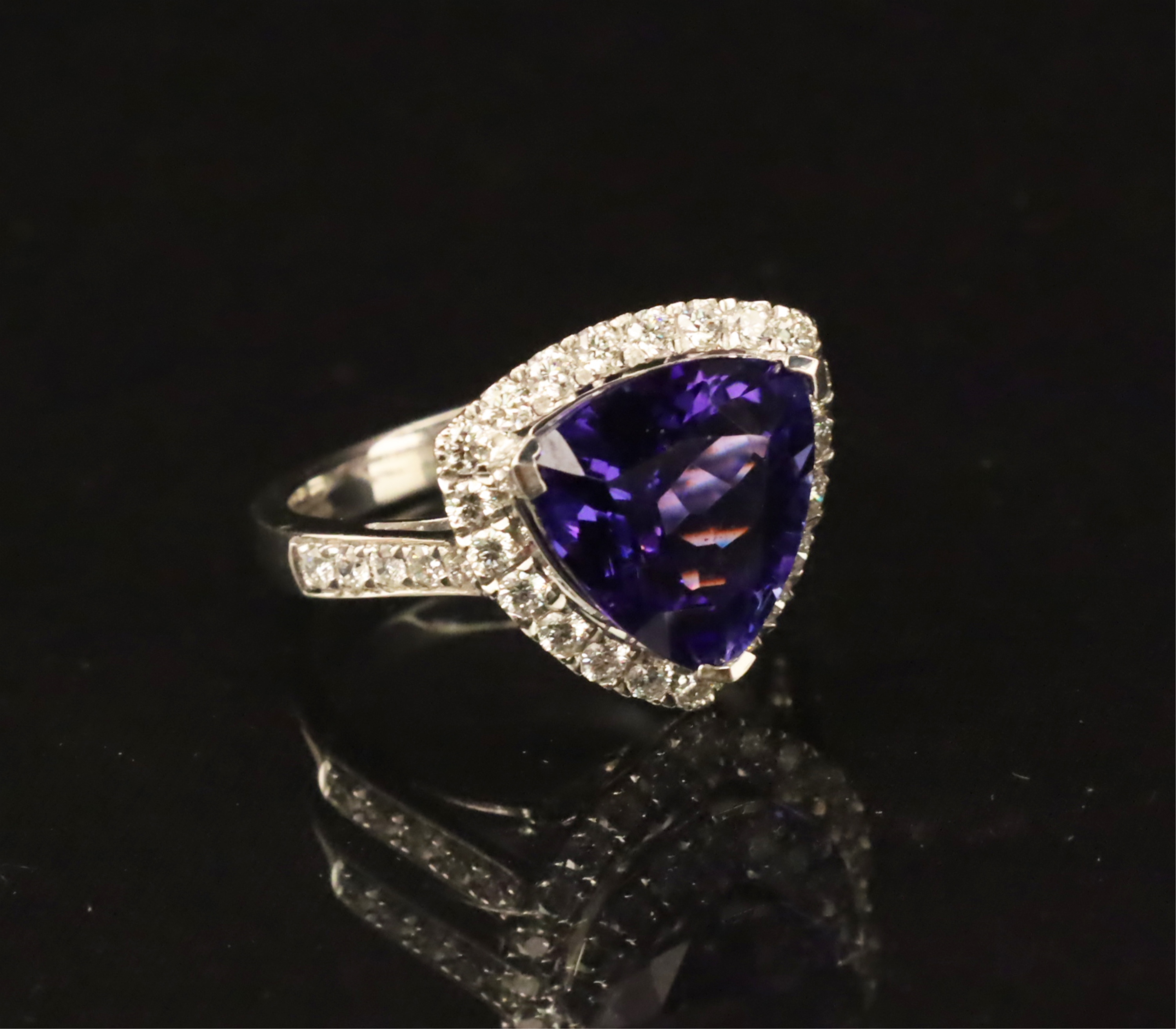 Appraisal: PLATINUM CT TANZANITE AND DIAMOND RING Platinum Tanzanite and Diamond