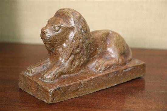 Appraisal: SEWERTILE LION Probably Ohio Reclining lion on a rectangular base