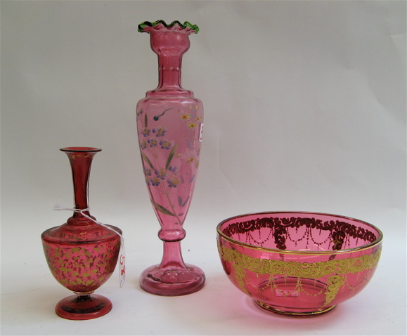 Appraisal: CRANBERRY GLASS BOWL AND TWO VASES pieces The bowl with