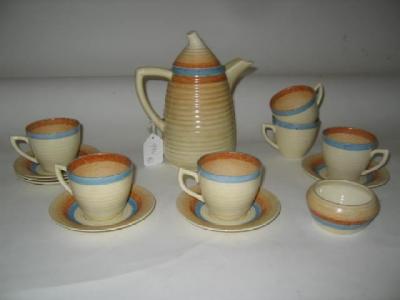 Appraisal: A CLARICE CLIFF COFFEE SET for six settings of reeded