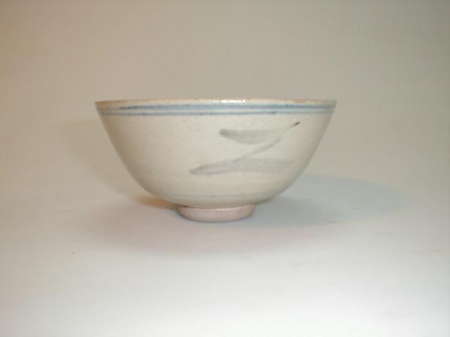 Appraisal: A Bernard Leach Studio stoneware small bowl externally decorated with