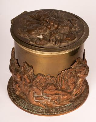 Appraisal: A plated biscuit barrel applied a band of Bacchanalian putto