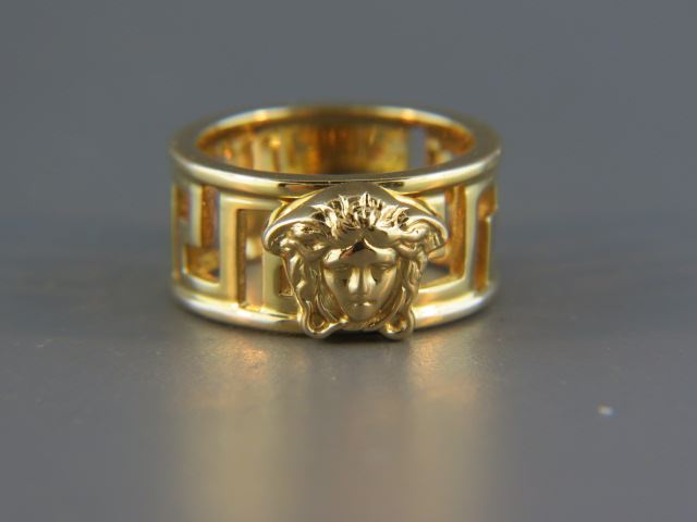 Appraisal: Versace K Gold Ring signed band style wide size grams