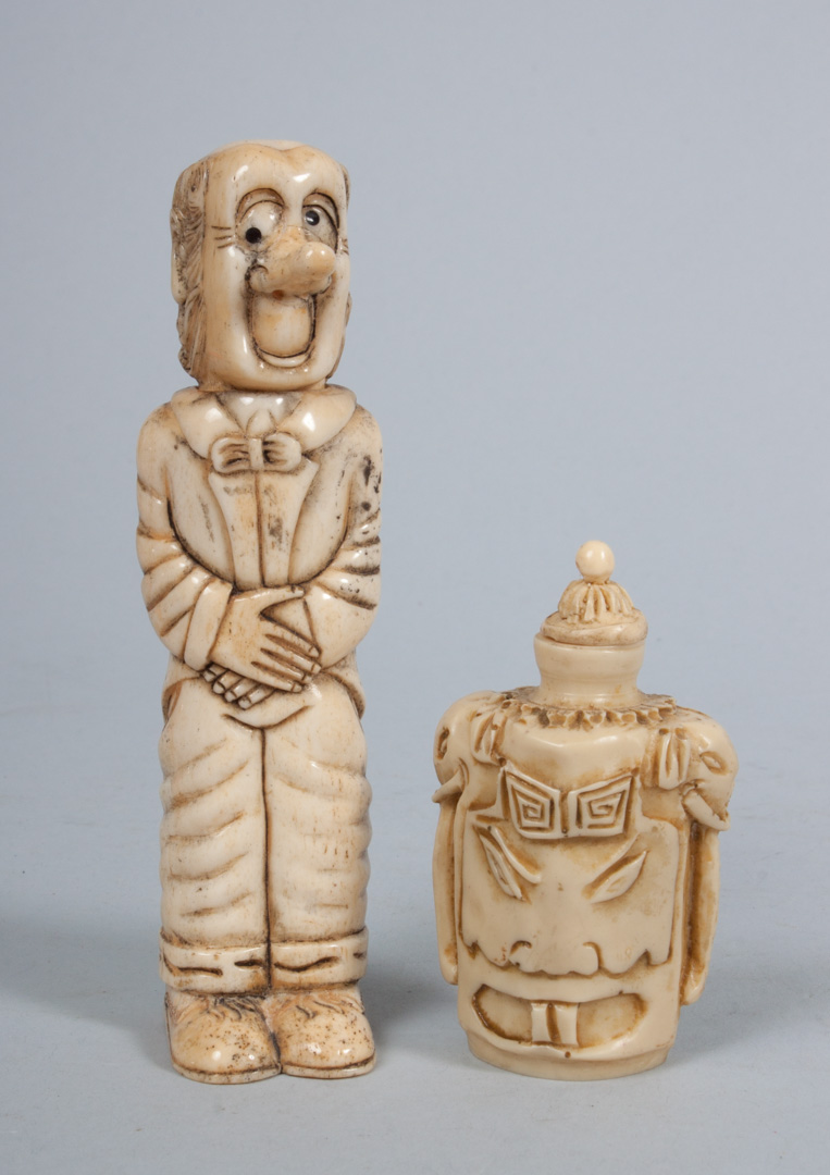 Appraisal: Continental carved ivory figural corkscrew modeled as comical drunken butler