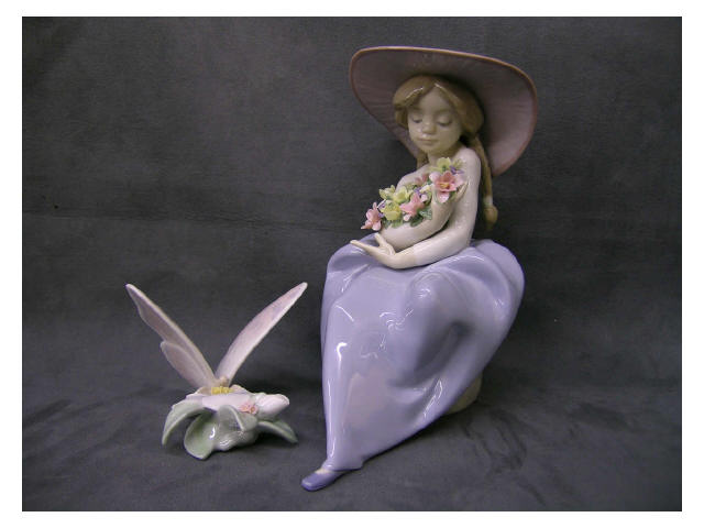 Appraisal: Lladro Porcelain Fragrant Bouquet figure depicting bonnet-wearing girl holding flowers