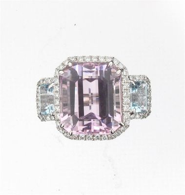 Appraisal: A kunzite topaz and diamond ring The emerald cut kunzite